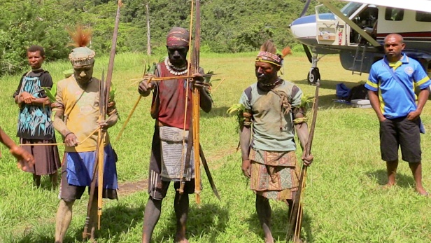 Breaking arrows as a sign of peace at Wanakipa, Papua New Guinea. MAF PNG. Photo credit: Anton Lutz