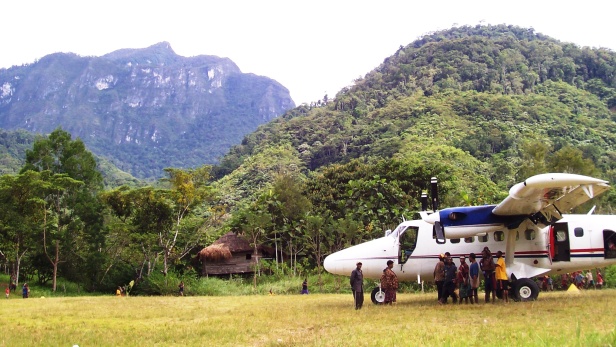 MAF Twin Otter aircraft on the airstrip at Wanakipa, Papua New Guinea. MAF PNG. Credit: Anton Lutz