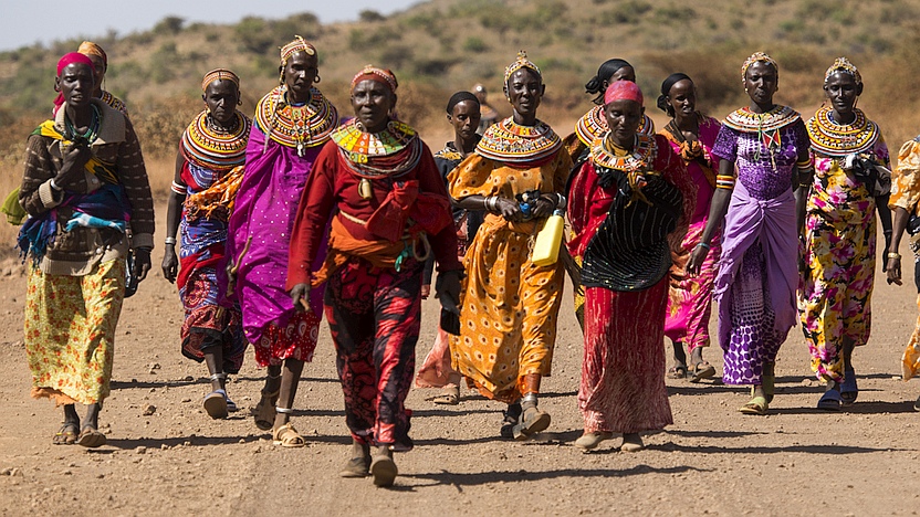 Rendille and Borana Women from the Sauti Moja peace project walk home together near Marsabit, northern Kenya. Photo: LuAnne Cadd