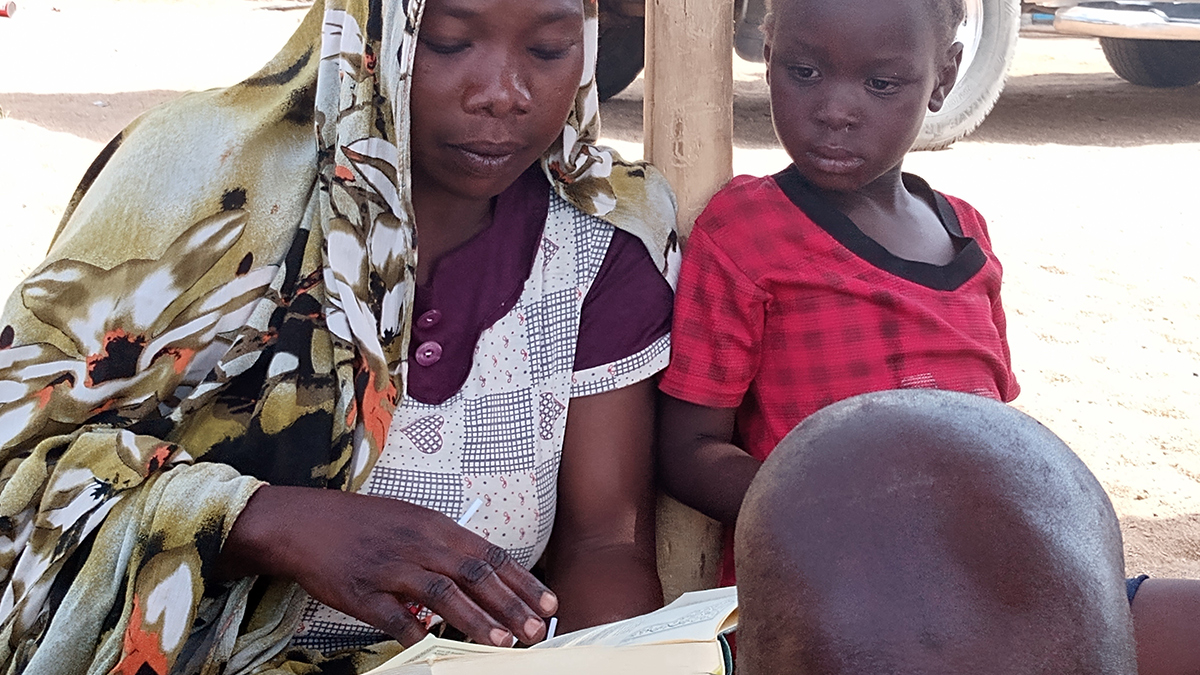 A believer reads the Bible in her own language for the first time