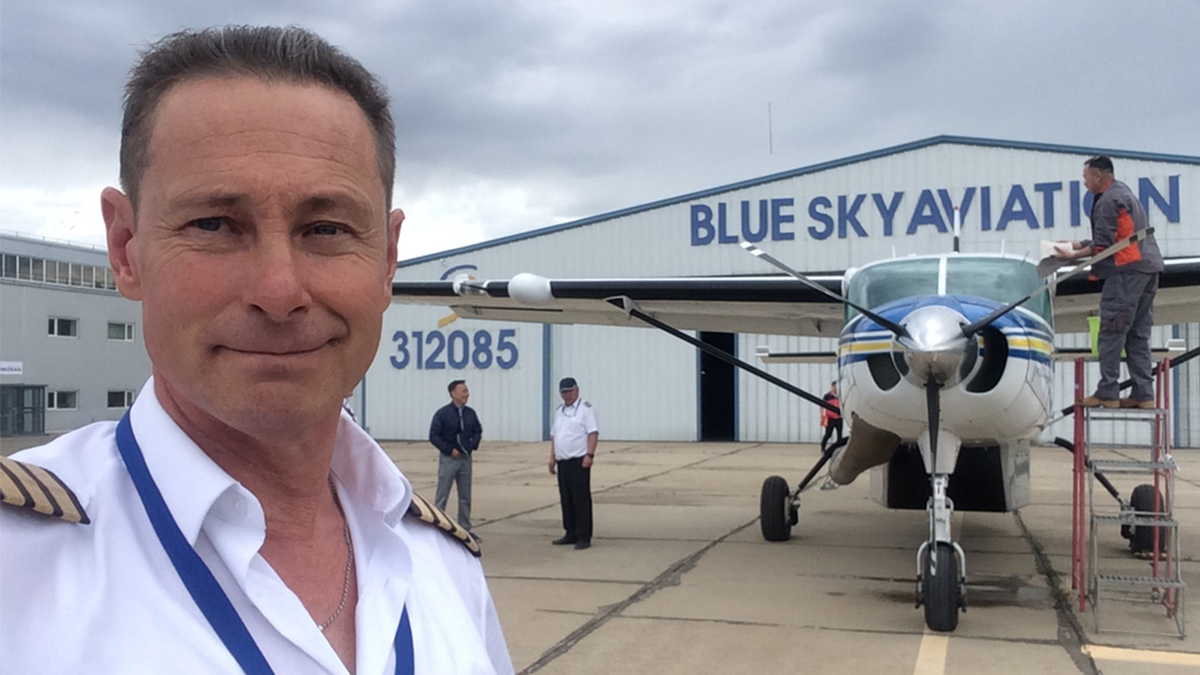 MAF’s Roy Rissanen with the Millennium Messenger outside Blue Sky Aviation’s hangar 