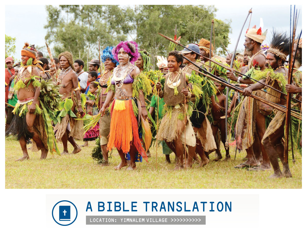 Picture of people in tribal dress with caption "A bible translation - location: Yimnalem village"