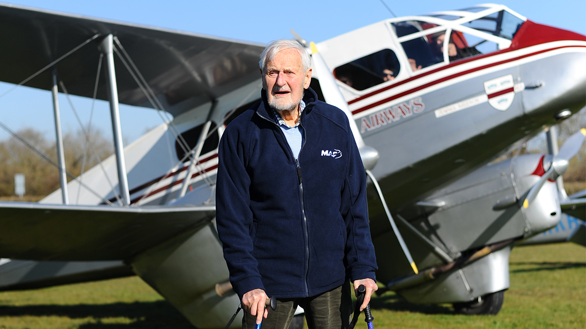 Jack in front of a De Havilland Rapide – the same model MAF used in Sudan, which Jack flew during the 1950s