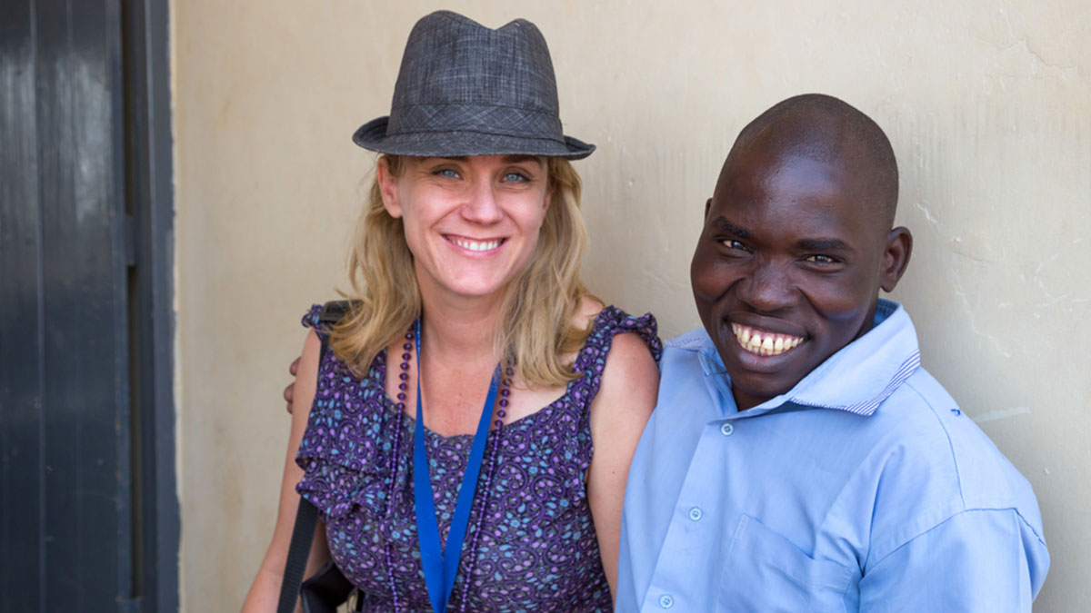 Jackson Mataya reunites with MAF Comms Officer, Jill Vine, in Arua, Uganda in 2017 