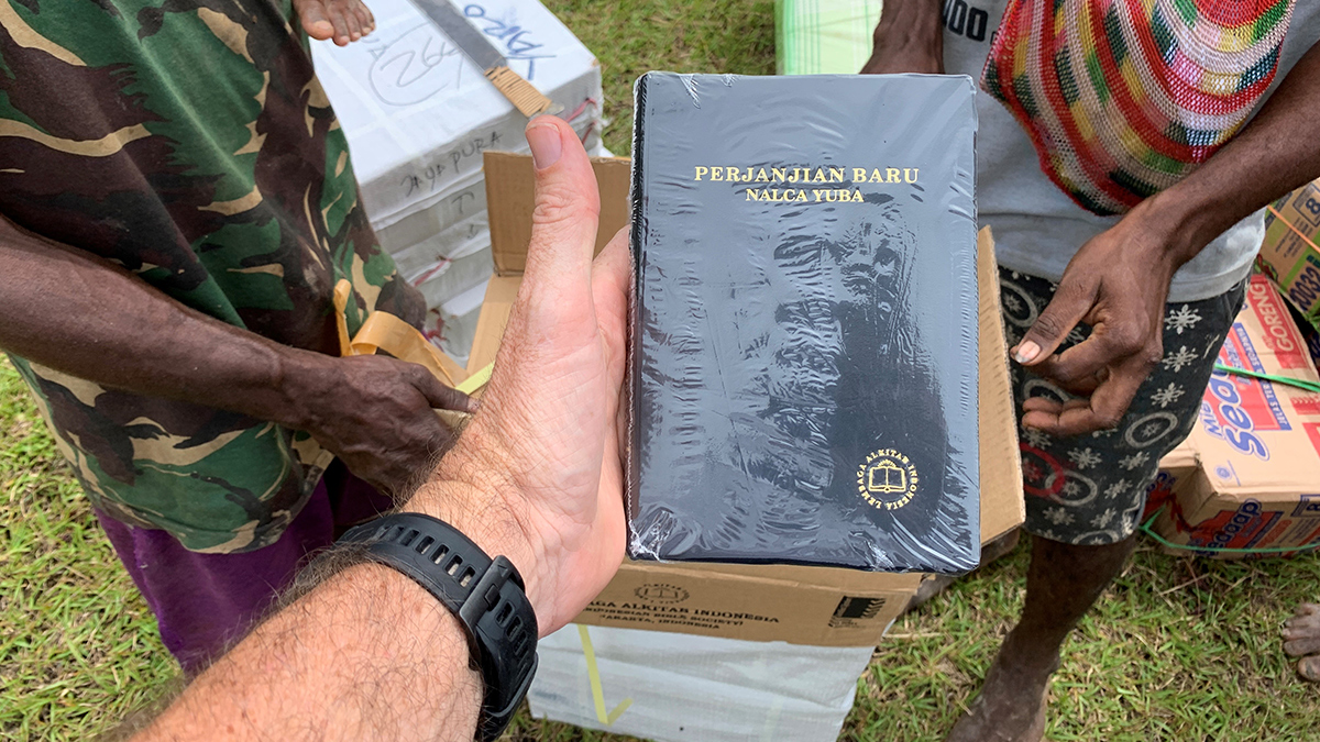 Boxes of the New Testament in the local Nalca language arrive in Emdoman Village