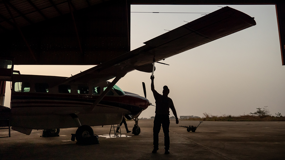 The aircraft undergoes a pre-flight inspection before she can fly in Guinea