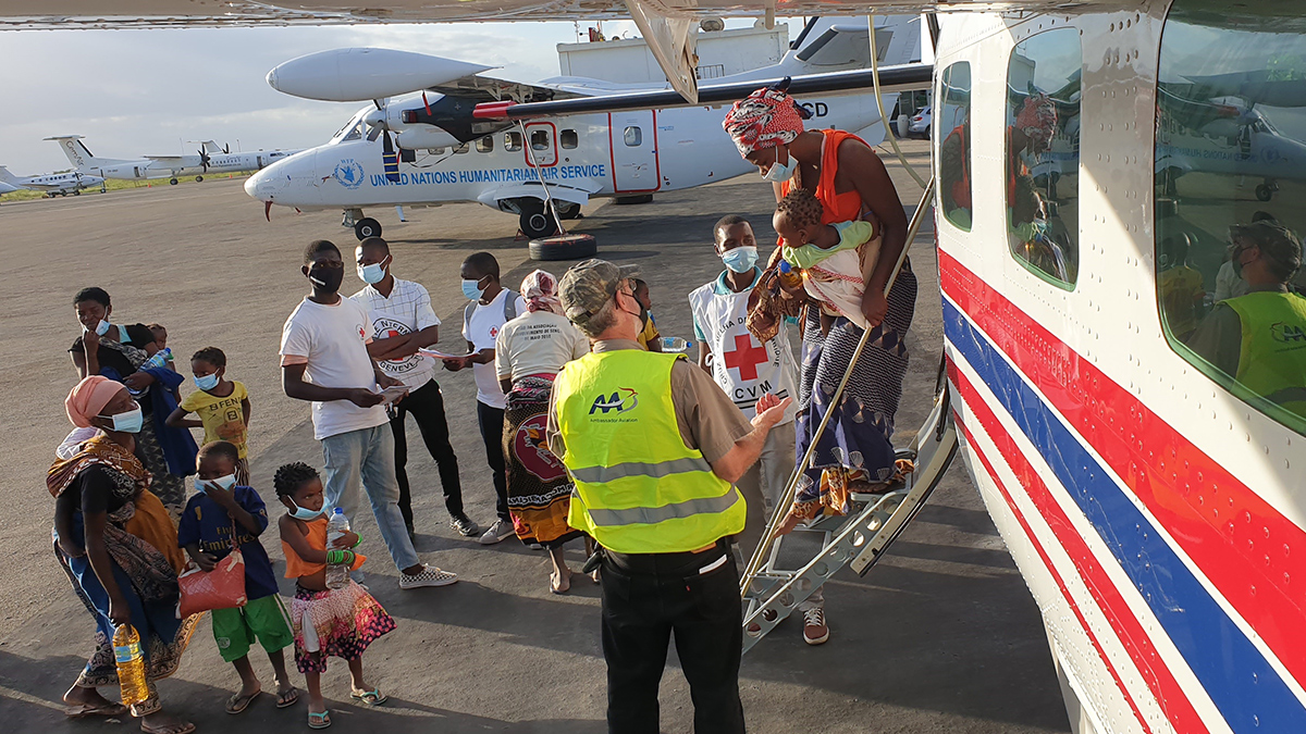 Evacuees land in Pemba where they are helped by the Red Cross