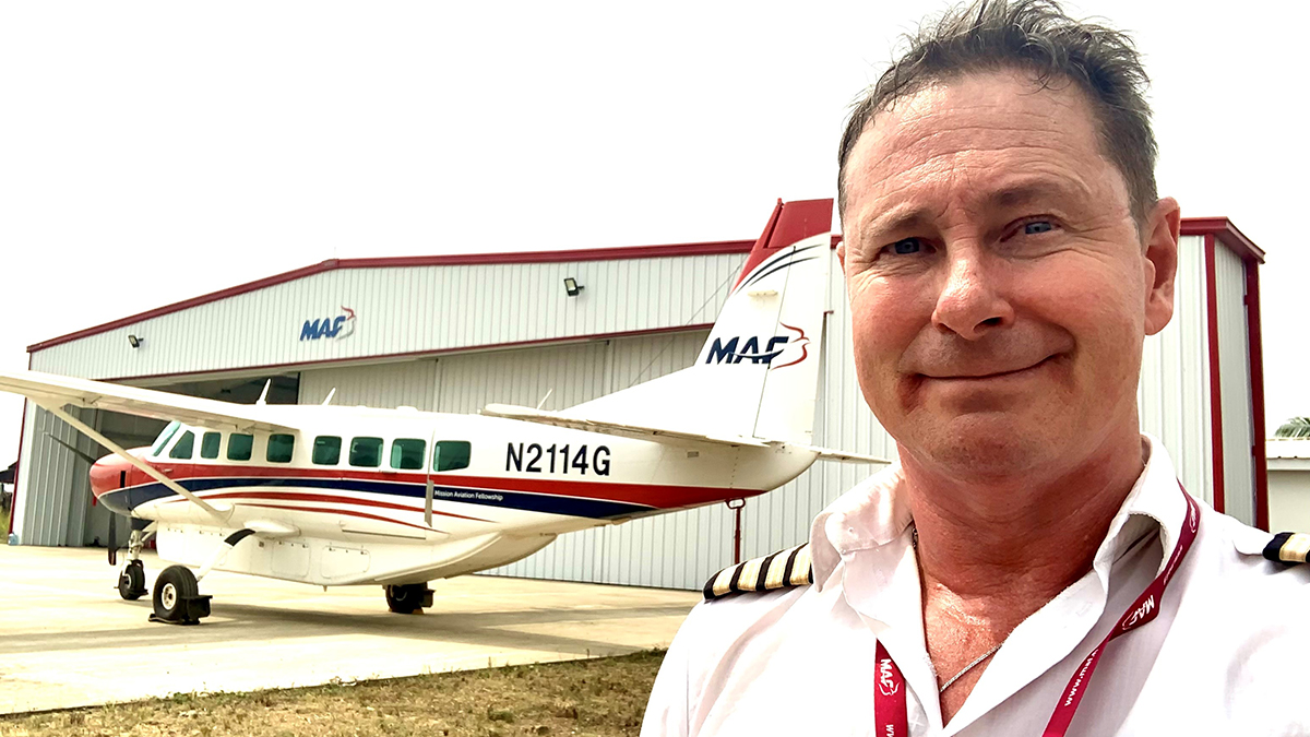 MAF’s Roy Rissanen with his beloved plane in Monrovia, Liberia en route to Uganda 