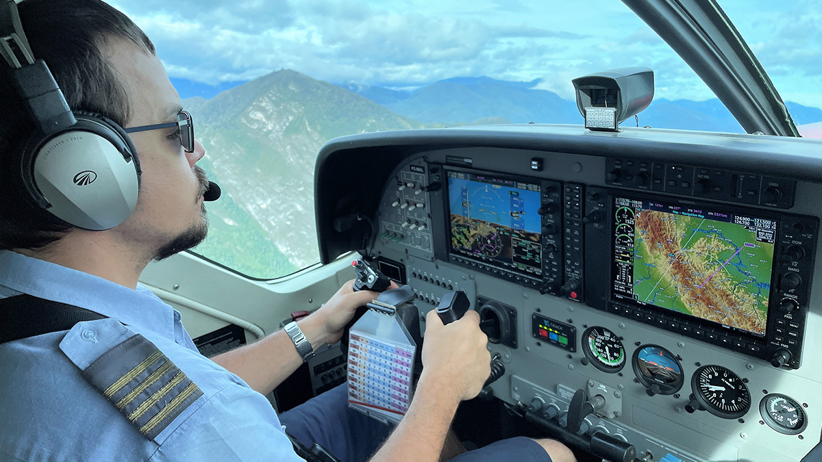 MAF pilot Ryan Cole navigates mountains and clouds en route to Edwaki 