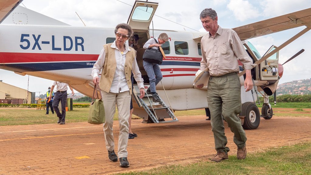 Princess Anne and Sir Tim Laurence in front of MAF plane