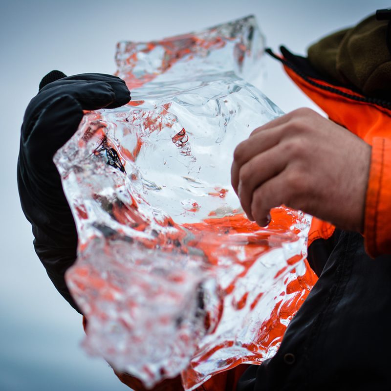 Picture of someone holding a big slab of ice