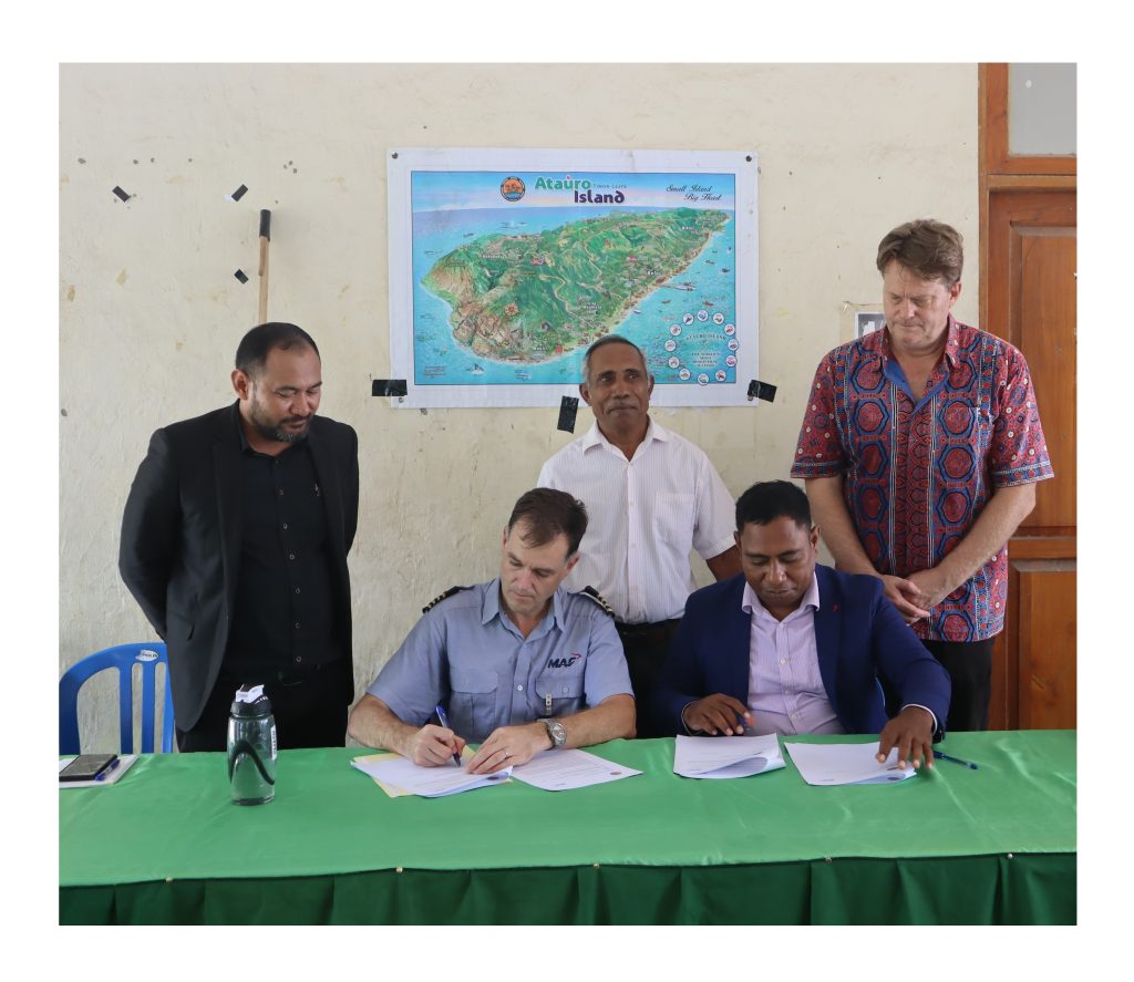 MAF Timor-Leste Country Director Nick Hitchins (front L) & President of ATKOMA Osaias Soares (front R) signing the contract on 15 March 2022 (credit: Lobitos Alves)