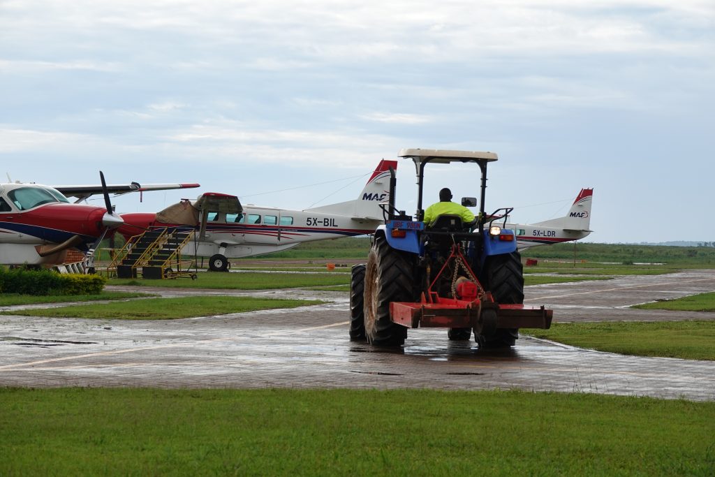 The New Holland tractor helps maintain Kajjansi’s runway (credit: Damalie Hirwa)