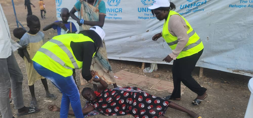 A lady collapsed in the camp, but there was no hospital to take her to (Credit: Concern SS / RRC)