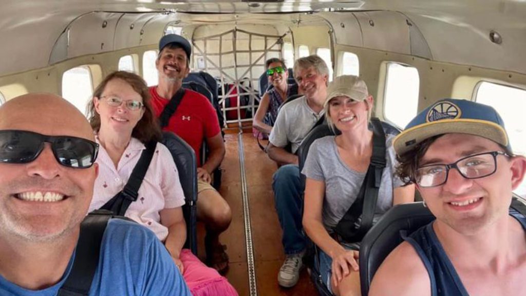 Janice (L) on board one of her many MAF flights to La Gonâve Island (credit: Dr Janice Cotrone)