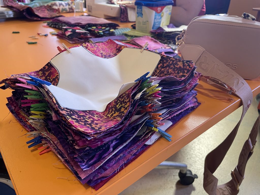 Hundreds of pads for rural PNG women are made at the Cairns Days for Girls centre (credit: Mandy Glass)