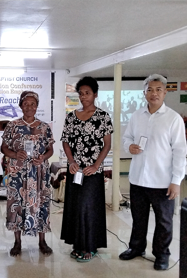 MAF partner Elajah Rapada (far right) says audio Bibles offer many benefits (credit: Elajah Rapada)