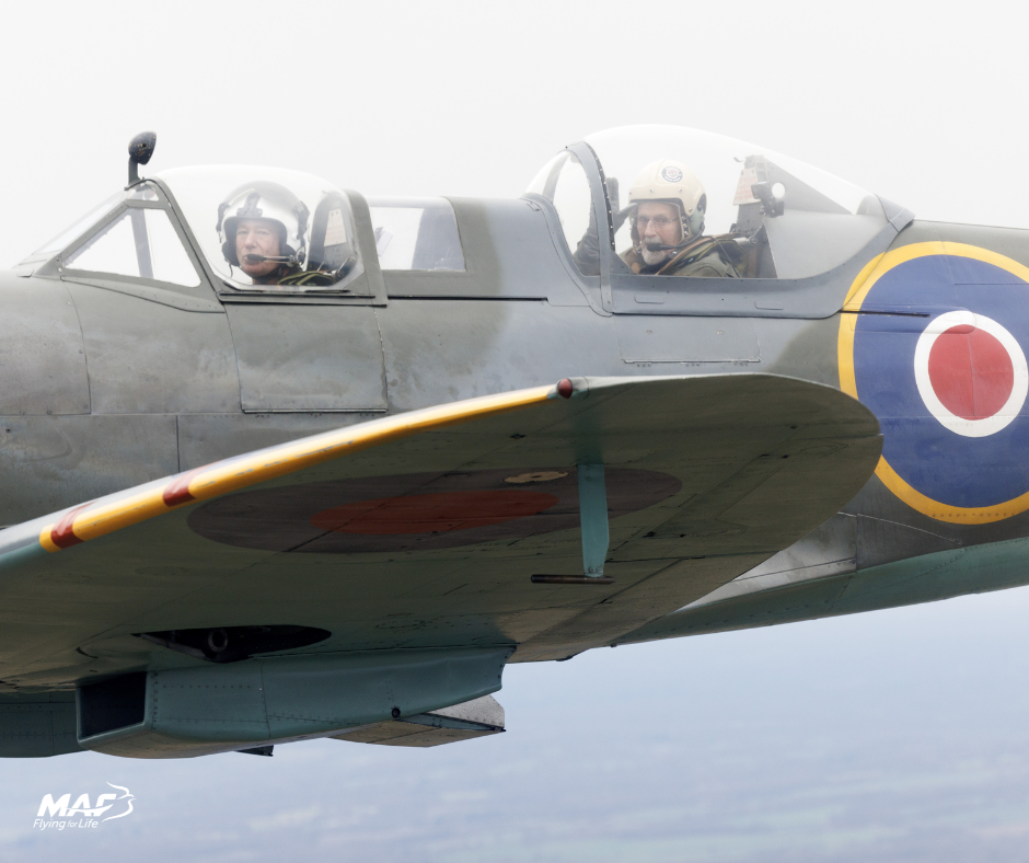 Jack is accompanied by pilot Barry Hughes as they fly over Kent (credit: Jonathan Buckmaster)