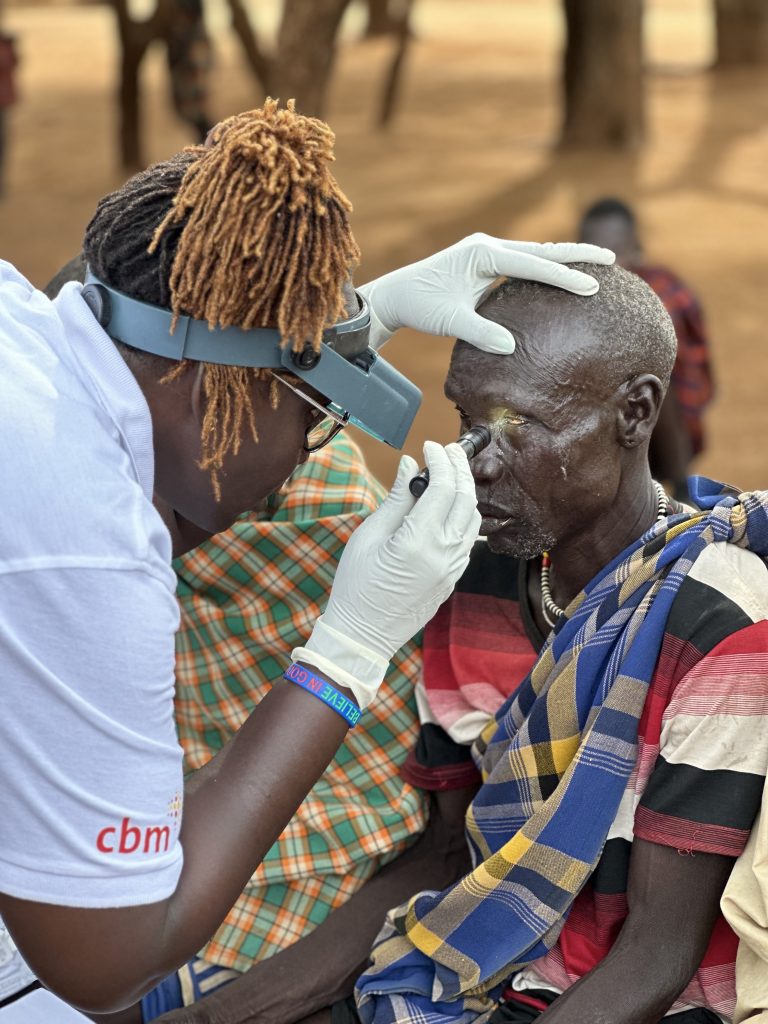 Dr Kuol and the team can assess up to a thousand people during one outreach (credit: Jenny Davies)